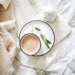 white teacup filled with coffee